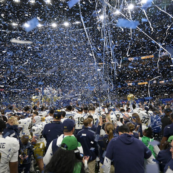 Notre Dame players celebrate after a quarterfinal game against Georgia in a College Football Playoff, Thursday, Jan. 2, 2025, in New Orleans. (AP Photo/Matthew Hinton)