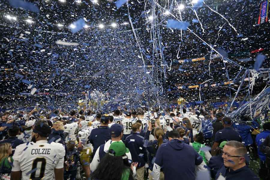 Notre Dame players celebrate after a quarterfinal game against Georgia in a College Football Playoff, Thursday, Jan. 2, 2025, in New Orleans. (AP Photo/Matthew Hinton)