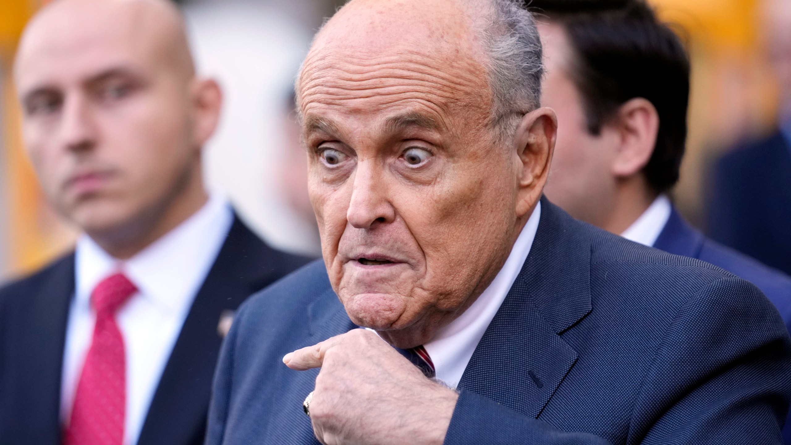 FILE — Former New York Mayor Rudy Giuliani speaks to the media as he leaves court in New York, Nov. 7, 2024. (AP Photo/Seth Wenig, File)