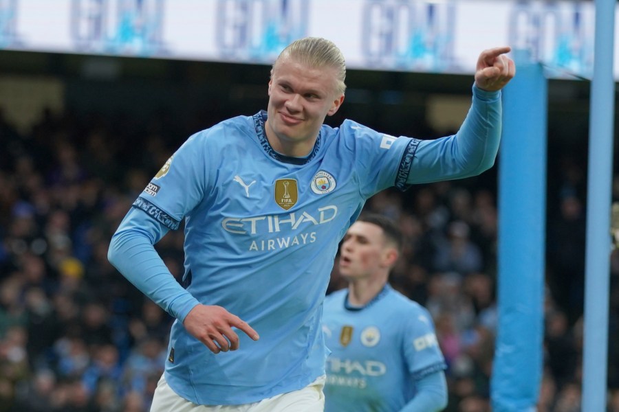 Manchester City's Erling Haaland celebrates after scoring his side's 2nd goal against West Ham during a English Premier League soccer match at Etihad stadium in Manchester, England, Saturday, Jan. 4, 2025. (AP Photo/Ian Hodgson)