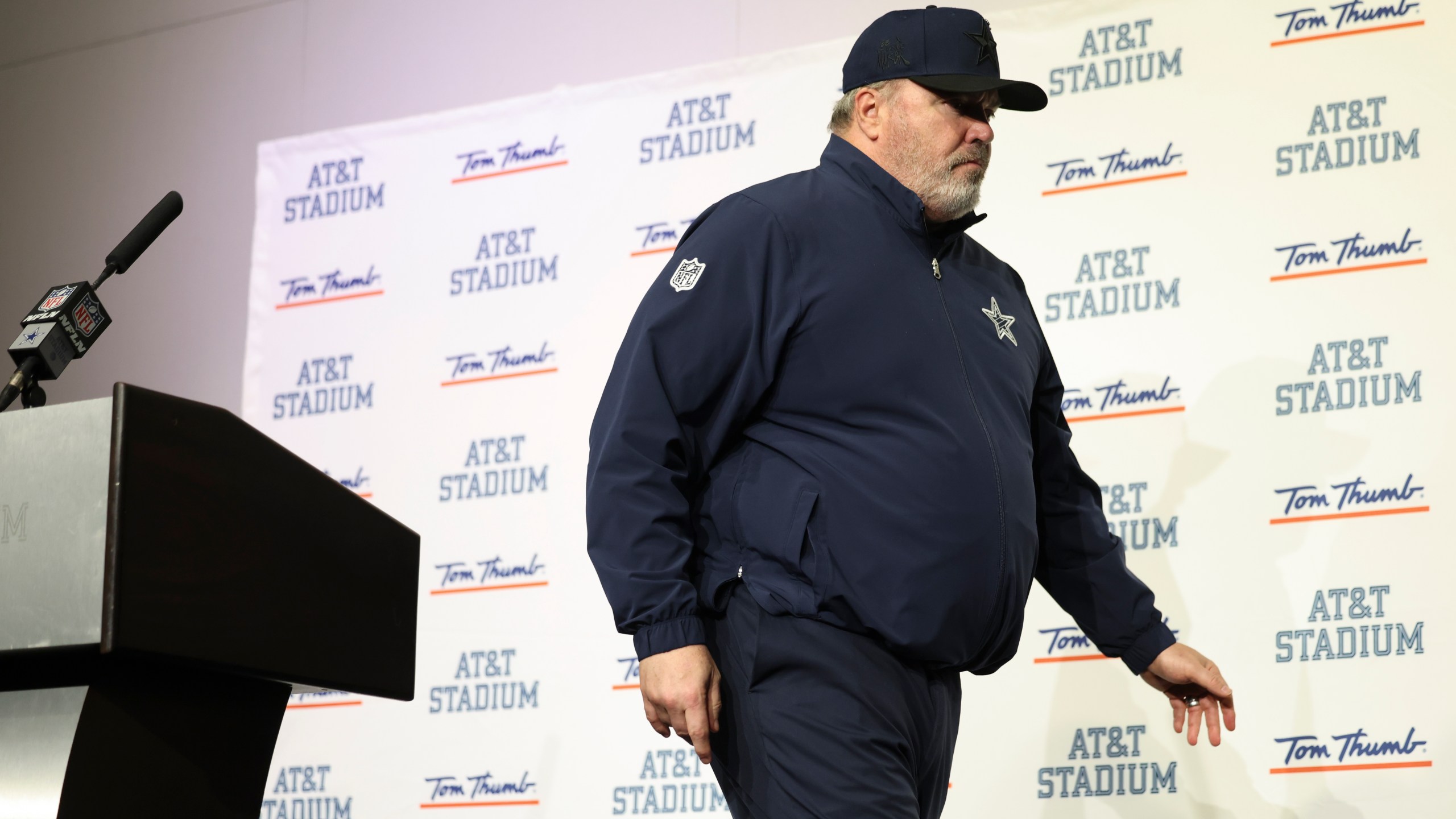 Dallas Cowboys head coach Mike McCarthy talks to reporters following an NFL football game against the Washington Commanders, Sunday, Jan. 5, 2025, in Arlington, Texas. The Commanders won 23-19. (AP Photo/Gareth Patterson)