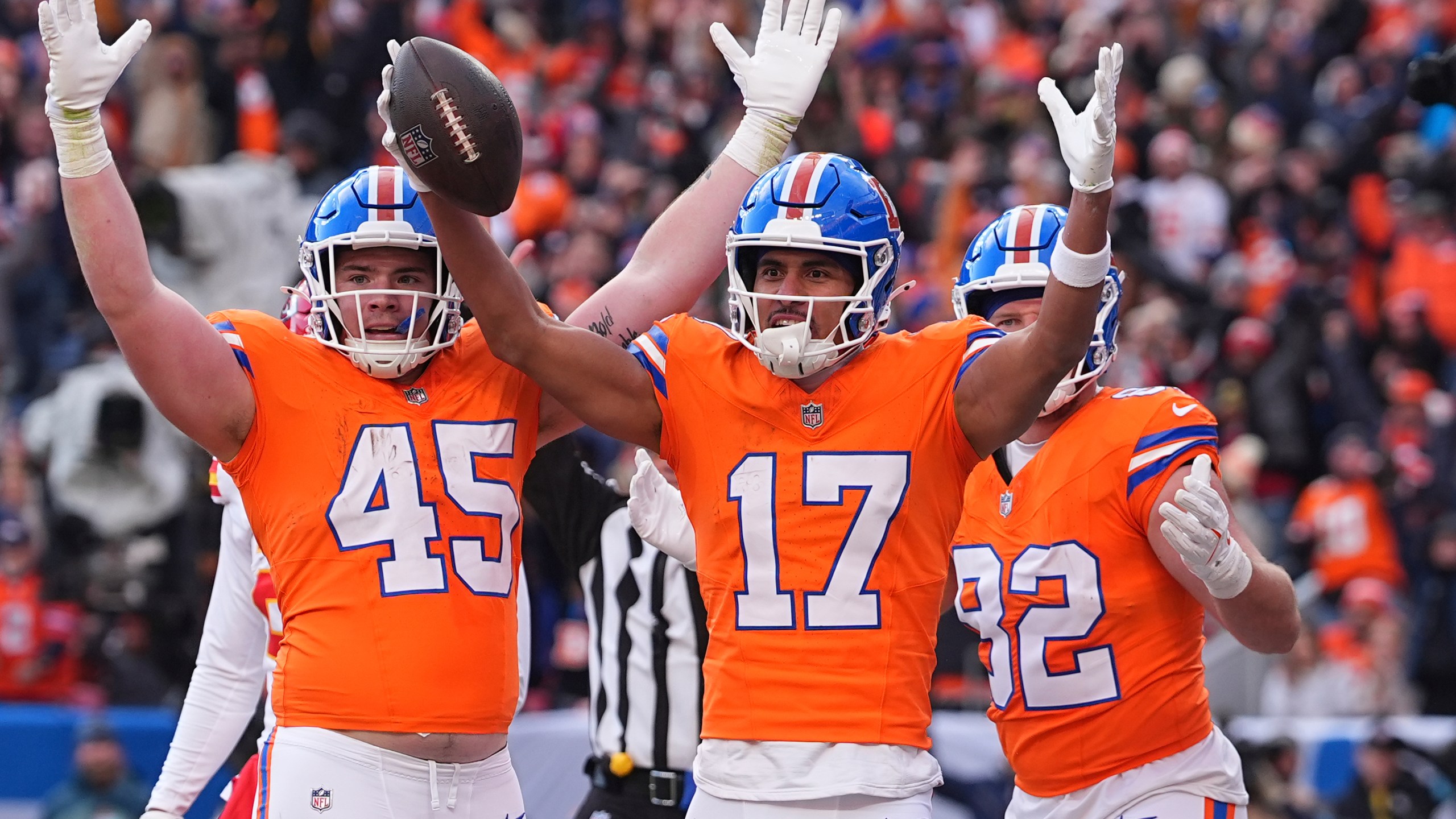 Denver Broncos wide receiver Devaughn Vele (17) celebrates after catching a touchdown pass during the first half of an NFL football game against the Kansas City Chiefs Sunday, Jan. 5, 2025, in Denver. (AP Photo/David Zalubowski)