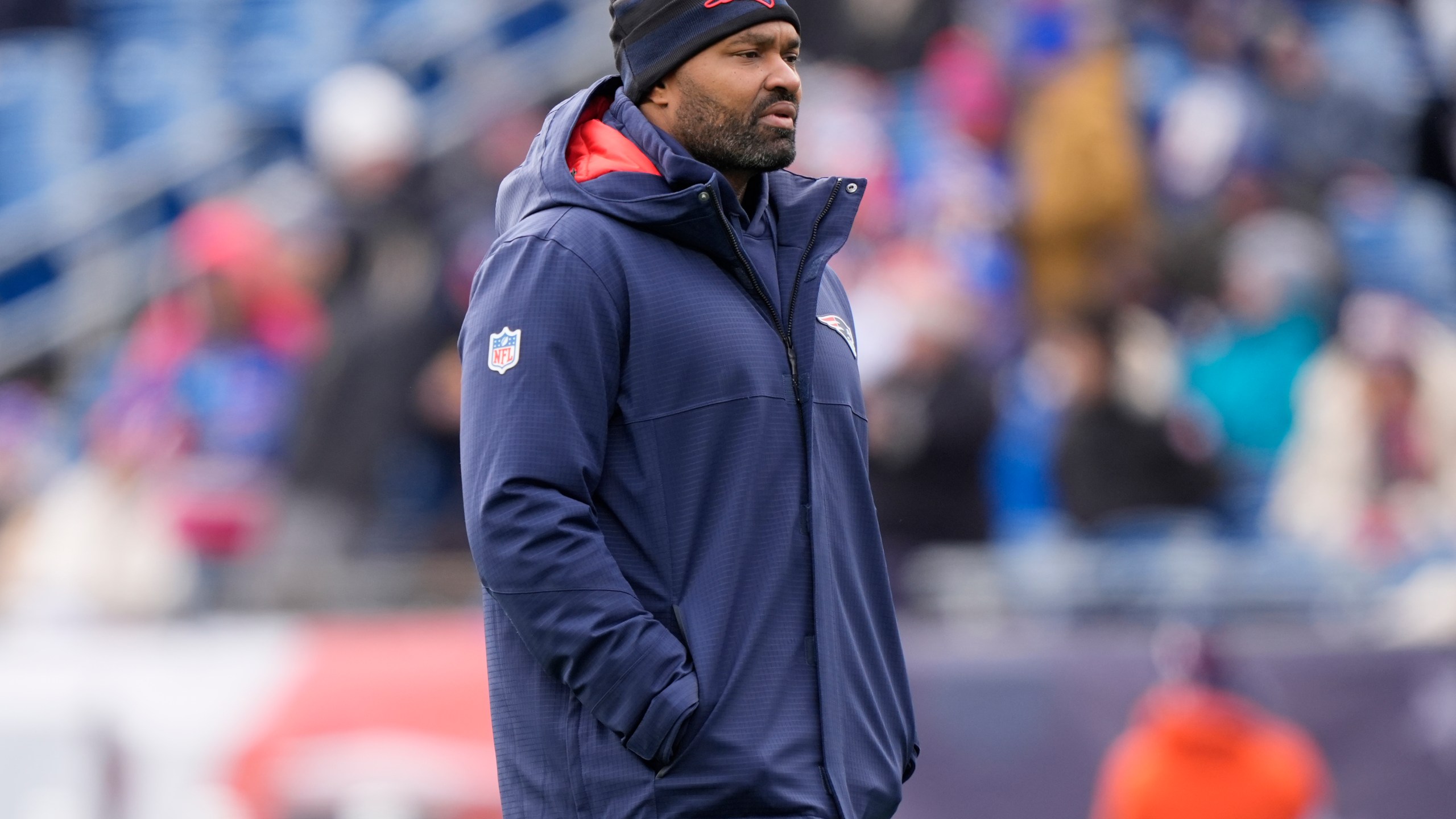 New England Patriots head coach Jerod Mayo walks on the field prior to an NFL football game against the Buffalo Bills, Sunday, Jan. 5, 2025, in Foxborough, Mass. (AP Photo/Robert F. Bukaty)