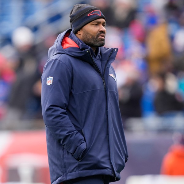 New England Patriots head coach Jerod Mayo walks on the field prior to an NFL football game against the Buffalo Bills, Sunday, Jan. 5, 2025, in Foxborough, Mass. (AP Photo/Robert F. Bukaty)