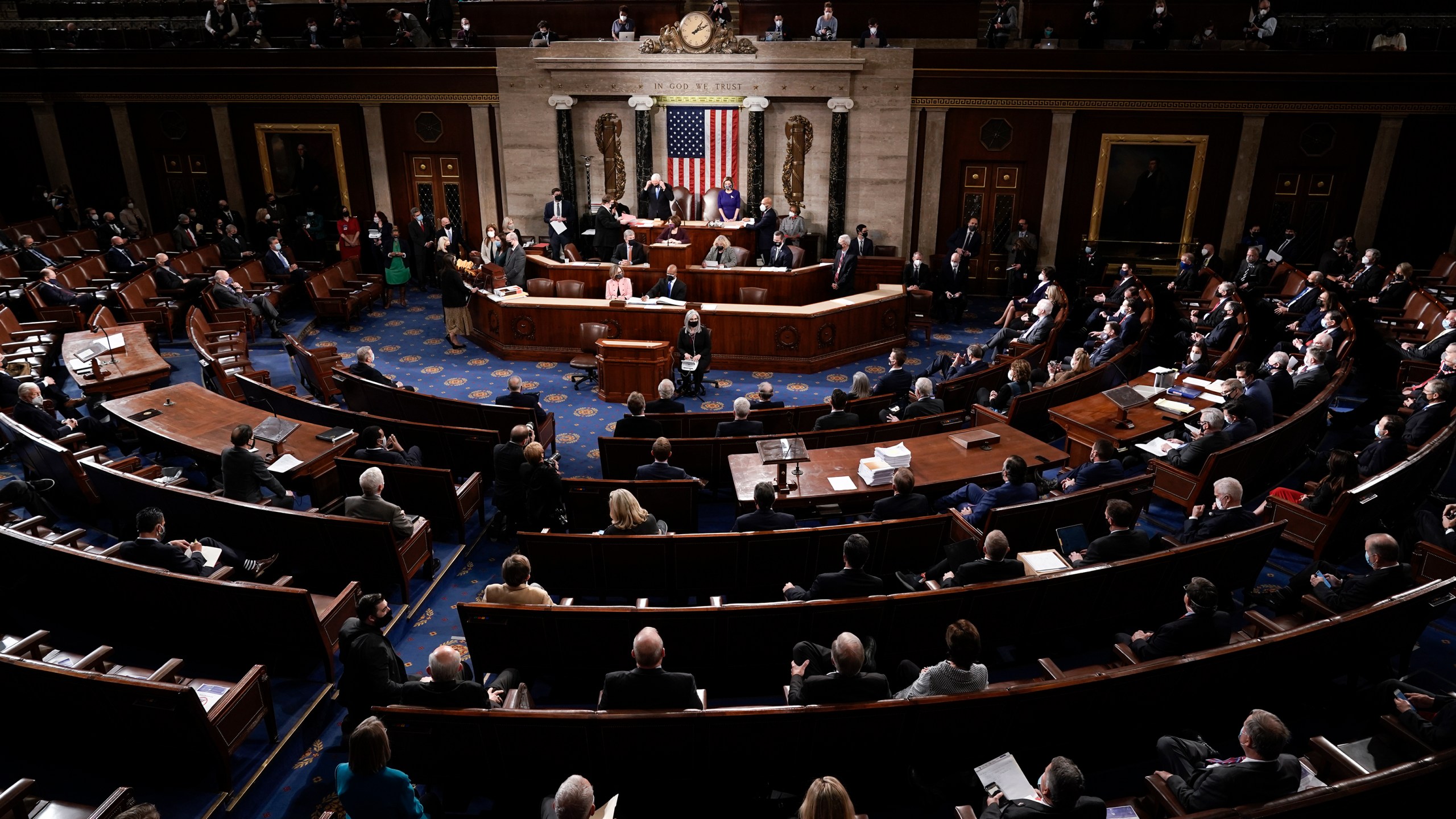 FILE - Vice President Mike Pence and Speaker of the House Nancy Pelosi, D-Calif., officiate as a joint session of the House and Senate convenes to count the Electoral College votes cast in the presidential election, at the Capitol in Washington, Jan. 6, 2021. (AP Photo/J. Scott Applewhite, File)