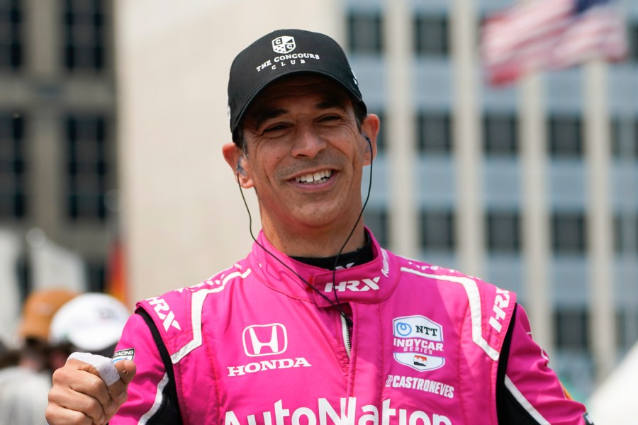 FILE - Helio Castroneves is introduced before the IndyCar Detroit Grand Prix auto race in Detroit, June 4, 2023. (AP Photo/Paul Sancya, file)