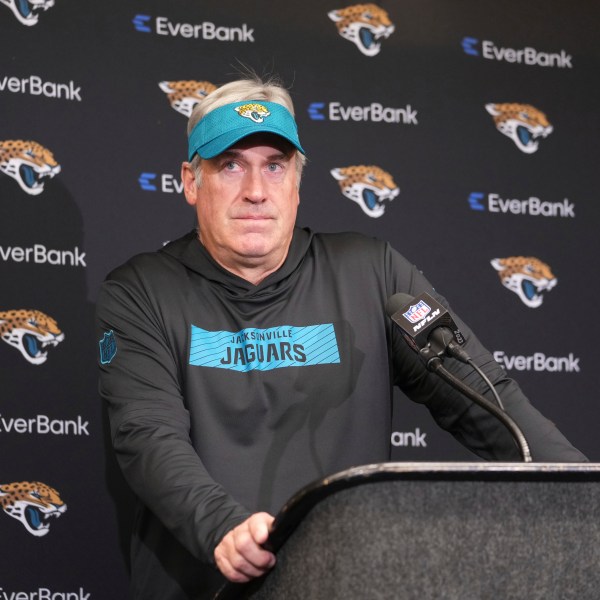 Jacksonville Jaguars head coach Doug Pederson pauses during a news conference after an NFL football game against the Indianapolis Colts, Sunday, Jan. 5, 2025, in Indianapolis. The Colts won 26-23 in overtime. (AP Photo/Michael Conroy)