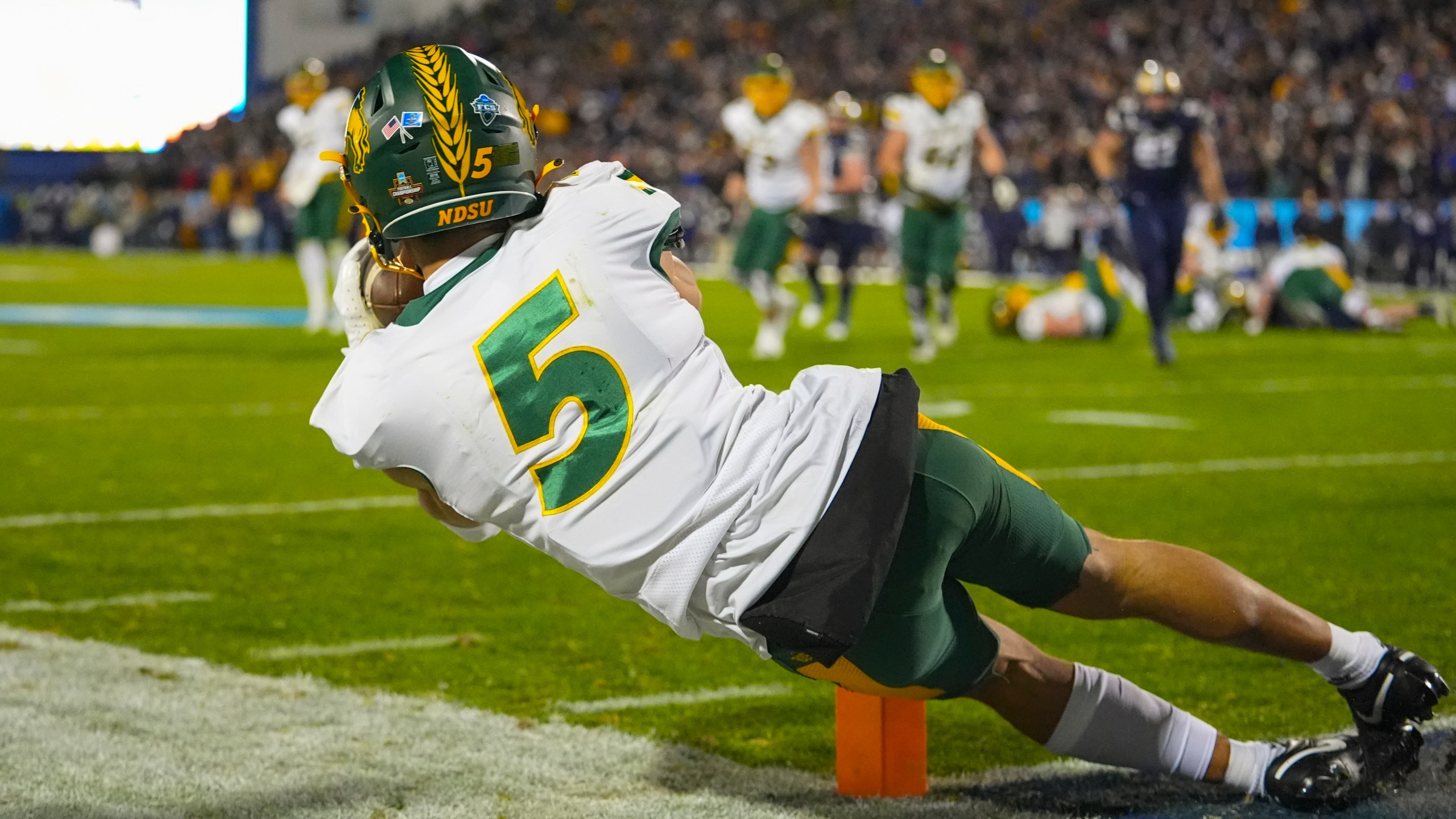 North Dakota State wide receiver Bryce Lance catches a pass near the Montana State goal line during the first half of the FCS Championship NCAA college football game, Monday, Jan. 6, 2025, in Frisco, Texas. (AP Photo/Julio Cortez)