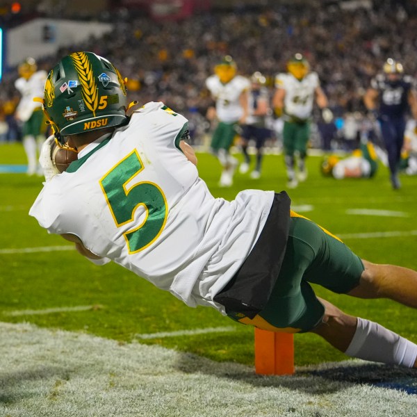 North Dakota State wide receiver Bryce Lance catches a pass near the Montana State goal line during the first half of the FCS Championship NCAA college football game, Monday, Jan. 6, 2025, in Frisco, Texas. (AP Photo/Julio Cortez)