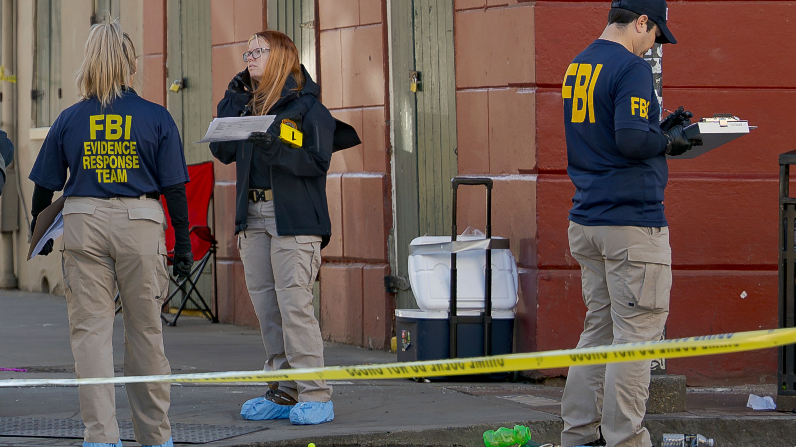 The FBI and a bomb squad earlier detonated a suspicious package found in this cooler at Bourbon St and Orleans Street in the French Quarter during the investigation of truck crashing into pedestrians followed by shooting on Bourbon Street in the French Quarter in New Orleans, Wednesday, Jan. 1, 2025. (AP Photo/Matthew Hinton)