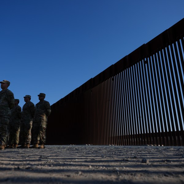 FILE - Members of the California National Guard listne during a news conference near the Otay Mesa Port of Entry along the border with Mexico, Dec. 5, 2024, in San Diego. (AP Photo/Gregory Bull, File)