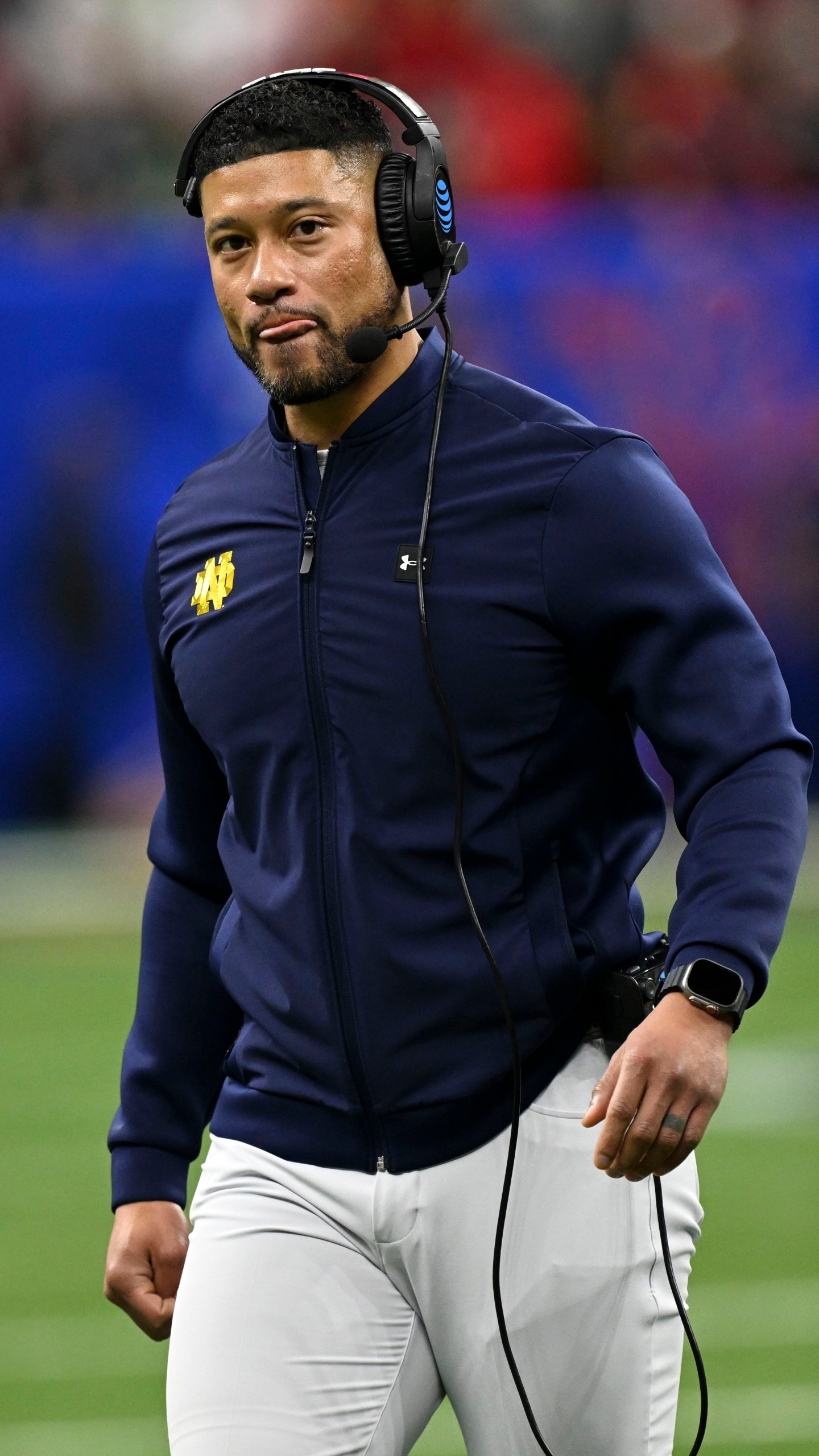 Notre Dame head coach Marcus Freeman watches from the sideline during the first half against Georgia in the quarterfinals of a College Football Playoff, Thursday, Jan. 2, 2025, in New Orleans. (AP Photo/Matthew Hinton)