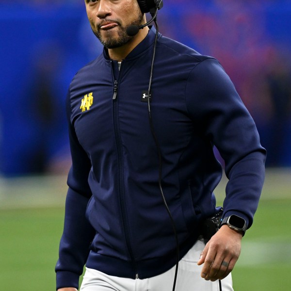 Notre Dame head coach Marcus Freeman watches from the sideline during the first half against Georgia in the quarterfinals of a College Football Playoff, Thursday, Jan. 2, 2025, in New Orleans. (AP Photo/Matthew Hinton)