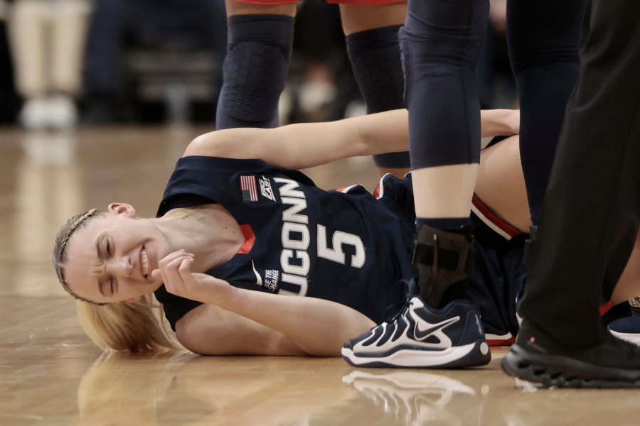 UConn's Paige Bueckers lies injured during an NCAA college basketball game against Villanova, Sunday, Jan. 5, 2025, in Villanova, Pa. (Elizabeth Robertson/The Philadelphia Inquirer via AP)