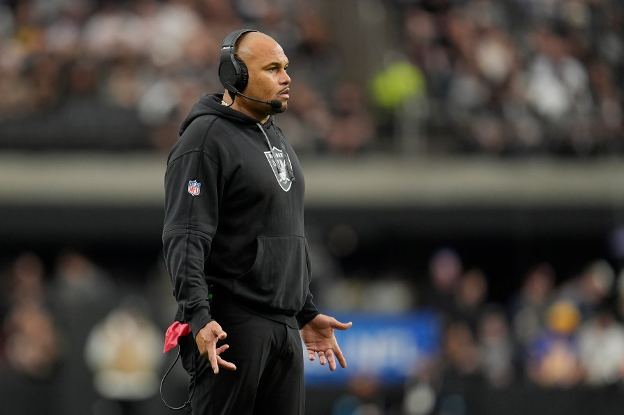 Las Vegas Raiders head coach Antonio Pierce reacts during the first half of an NFL football game against the Los Angeles Chargers in Las Vegas, Sunday, Jan. 5, 2025. (AP Photo/Abbie Parr)