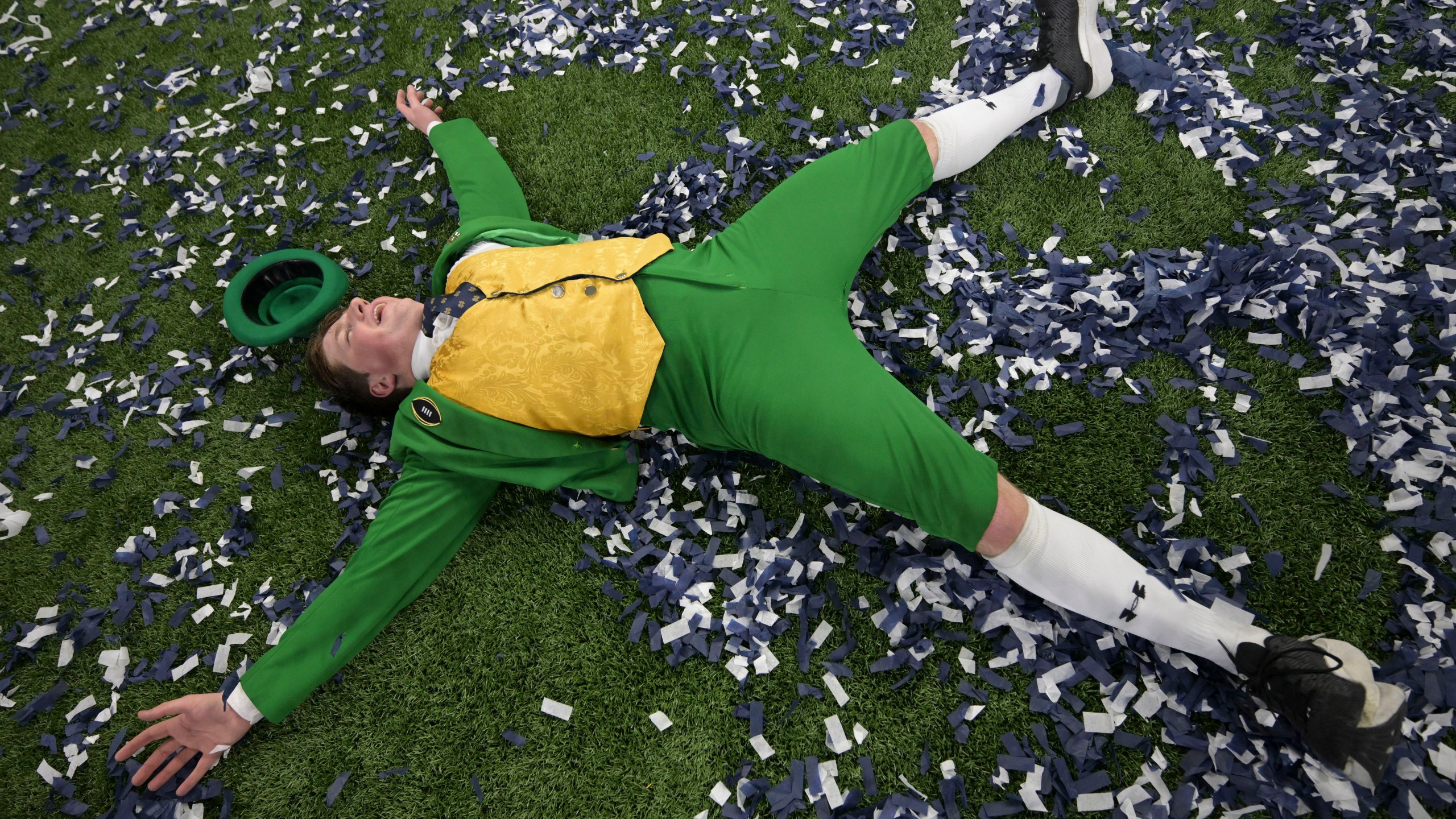 Notre Dame mascot Colin Mahoney celebrates after a quarterfinal game against Georgia in a College Football Playoff, Thursday, Jan. 2, 2025, in New Orleans. (AP Photo/Matthew Hinton)