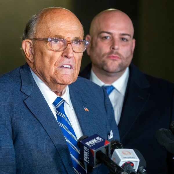 Rudy Giuliani speaks to the media outside Manhattan federal court in New York after testifying in a contempt hearing, Friday, Jan. 3, 2025. (AP Photo/Ted Shaffrey)