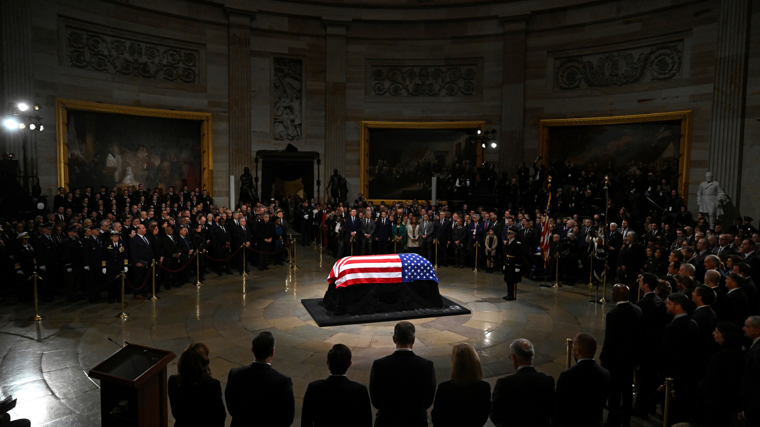 The flag-draped casket of former President Jimmy Carter lies in state during a ceremony in the Capitol, Tuesday, Jan. 7, 2025, in Washington. Carter died Dec. 29 at the age of 100. (Saul Loeb/Pool via AP)