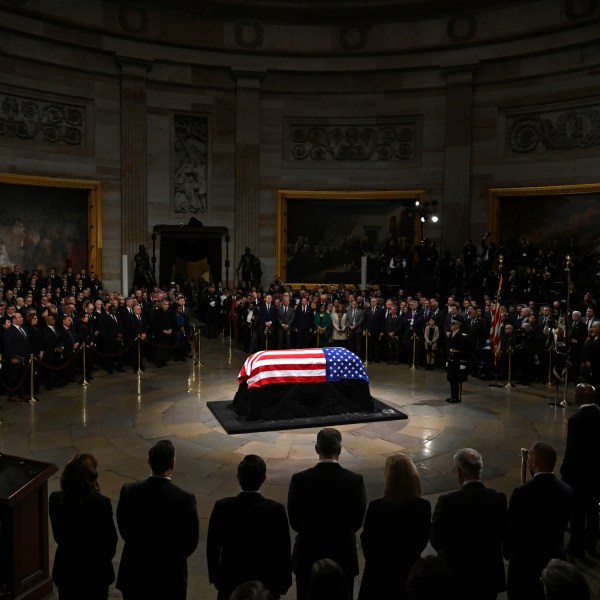 The flag-draped casket of former President Jimmy Carter lies in state during a ceremony in the Capitol, Tuesday, Jan. 7, 2025, in Washington. Carter died Dec. 29 at the age of 100. (Saul Loeb/Pool via AP)