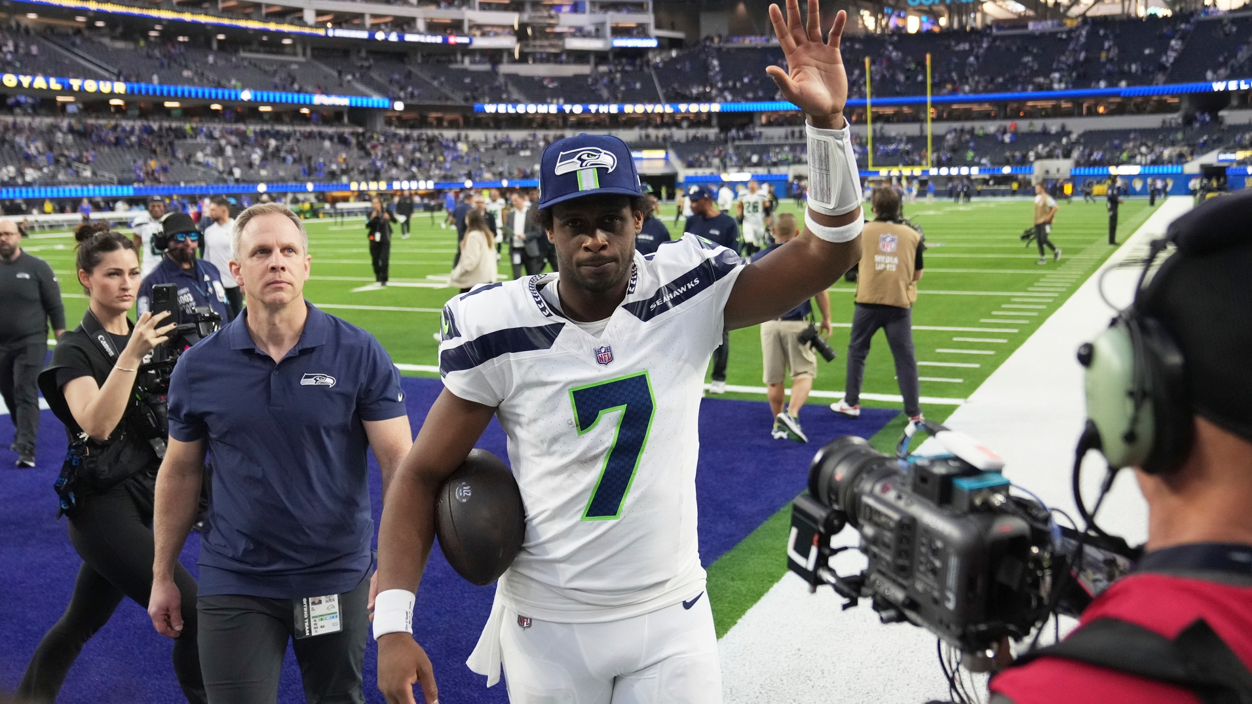 Seattle Seahawks quarterback Geno Smith (7) walks off the field after a win over the Los Angeles Rams in an NFL football game Sunday, Jan. 5, 2025, in Inglewood, Calif. (AP Photo/Eric Thayer)