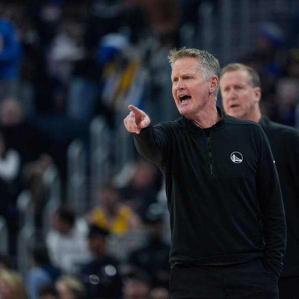 Golden State Warriors head coach Steve Kerr gestures during the first half of an NBA basketball game against the Miami Heat, Tuesday, Jan. 7, 2025, in San Francisco. (AP Photo/Godofredo A. Vásquez)