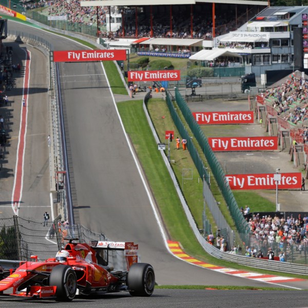 FILE - Ferrari driver Sebastian Vettel of Germany steers his car during the second free practice at the Spa-Francorchamps circuit, Belgium, on Aug. 21, 2015. (AP Photo/Luca Bruno, File)