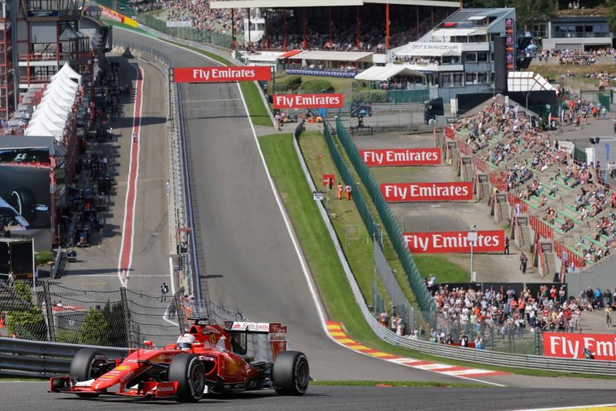 FILE - Ferrari driver Sebastian Vettel of Germany steers his car during the second free practice at the Spa-Francorchamps circuit, Belgium, on Aug. 21, 2015. (AP Photo/Luca Bruno, File)