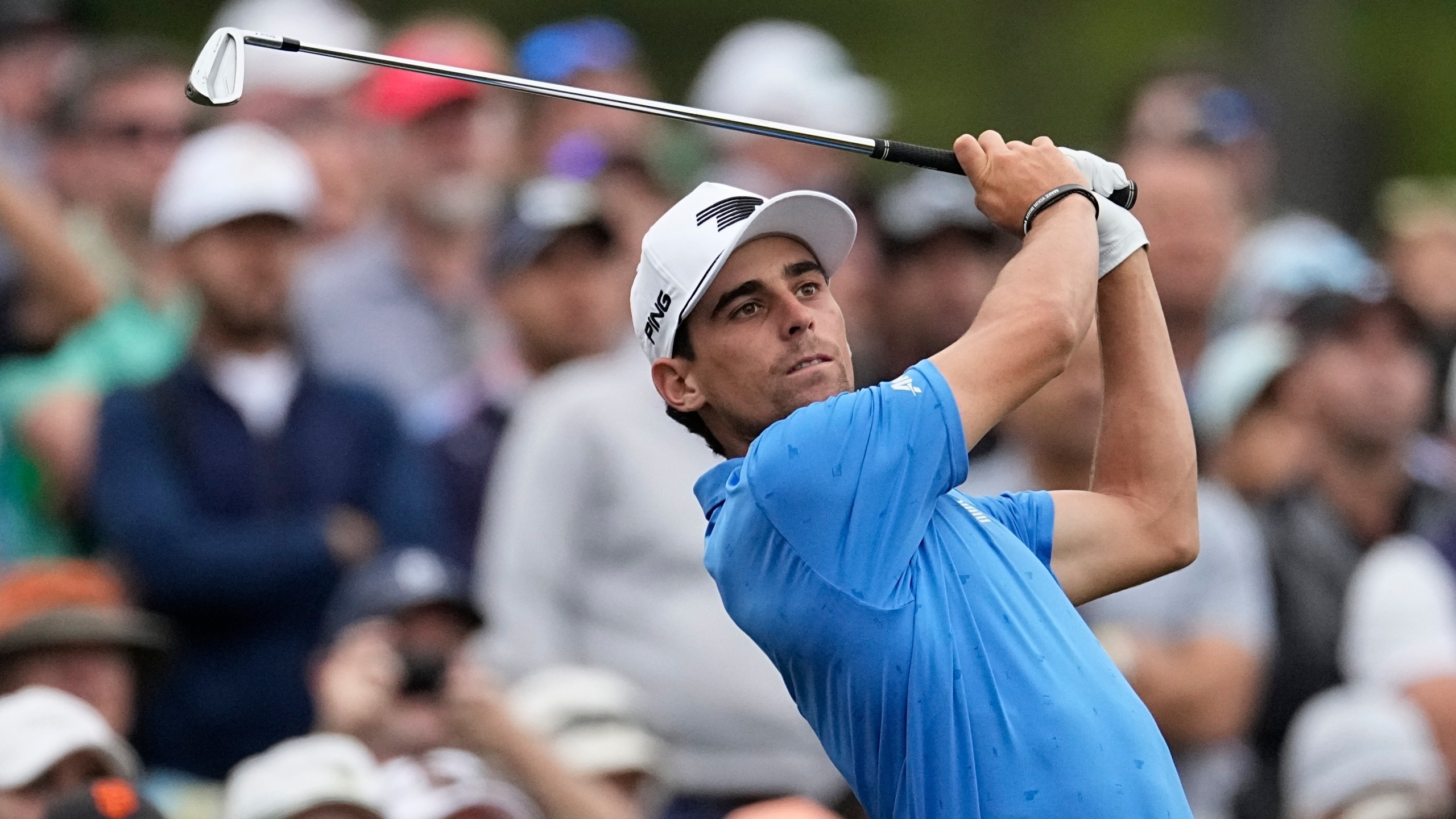 FILE - Joaquin Niemann, of Chile, watches his shot on the 12th hole during a practice round in preparation for the Masters golf tournament at Augusta National Golf Club Tuesday, April 9, 2024, in Augusta, Ga. (AP Photo/George Walker IV, File)