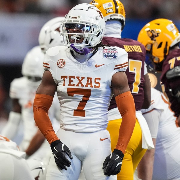 Texas defensive back Jahdae Barron (7) celebrates a defensive play against Arizona State during the first half in the quarterfinals of a College Football Playoff, Wednesday, Jan. 1, 2025, in Atlanta. (AP Photo/Brynn Anderson)