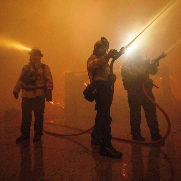 Fire crews battle the Eaton Fire Wednesday, Jan. 8, 2025 in Altadena, Calif. (AP Photo/Ethan Swope)