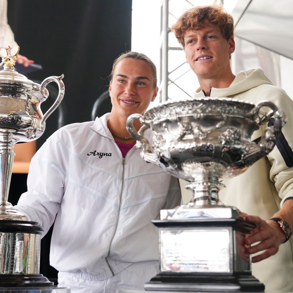 Defending champions Aryna Sabalenka and Jannik Sinner attend the official draw ceremony ahead of the Australian Open tennis championship in Melbourne, Australia, Thursday, Jan. 9, 2025. (AP Photo/Vincent Thian)