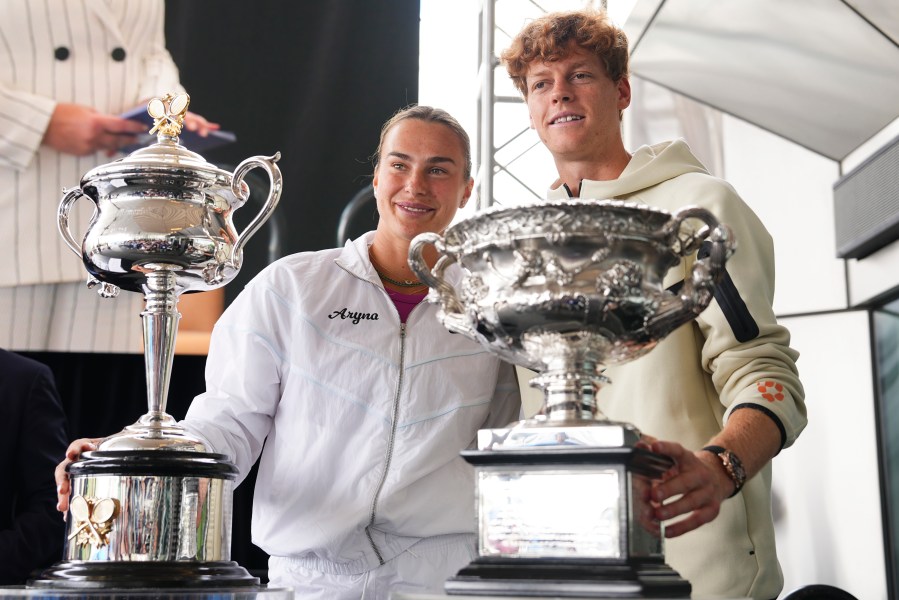 Defending champions Aryna Sabalenka and Jannik Sinner attend the official draw ceremony ahead of the Australian Open tennis championship in Melbourne, Australia, Thursday, Jan. 9, 2025. (AP Photo/Vincent Thian)