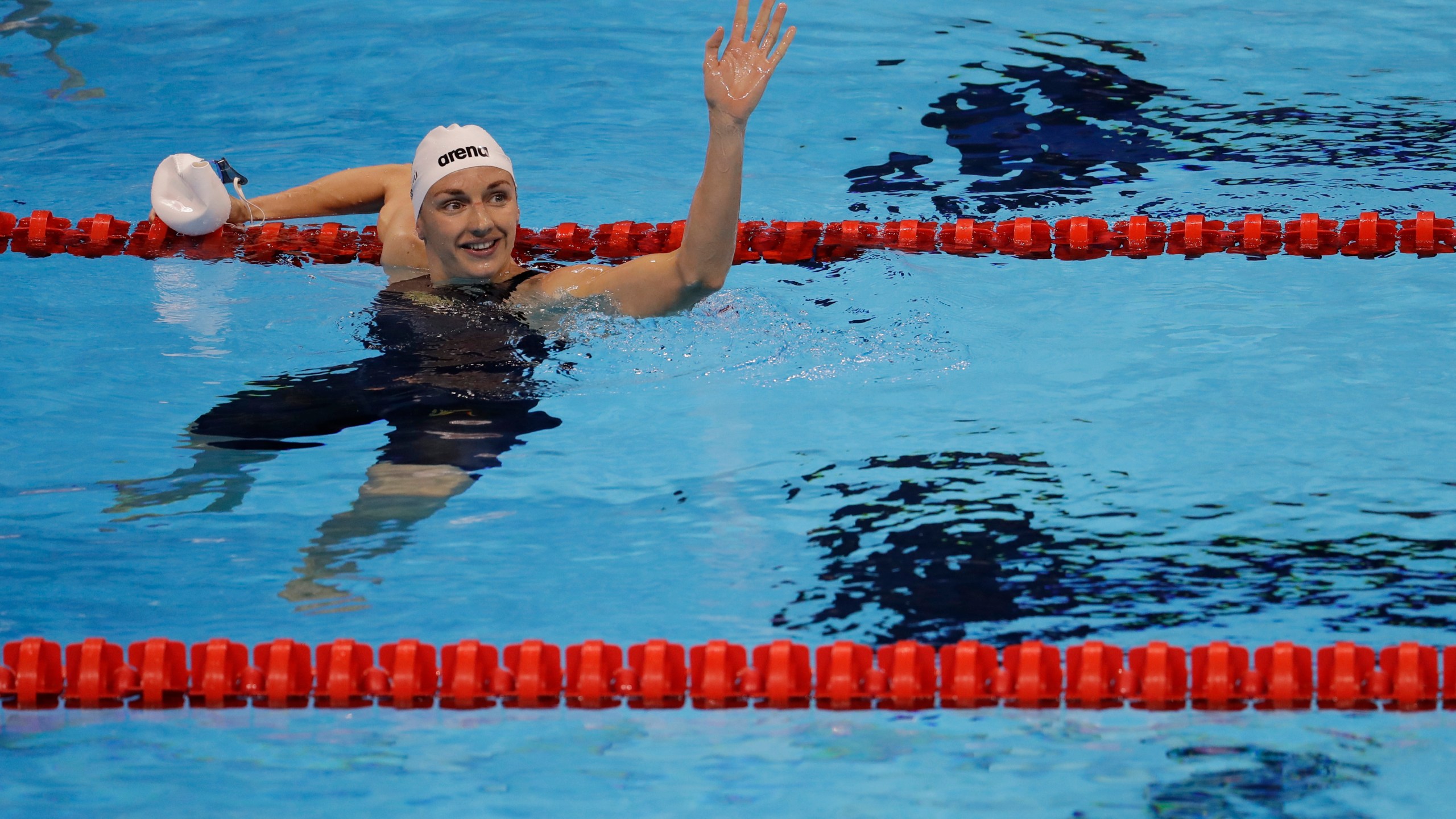 FILE - Hungary's Katinka Hosszu waves after winning a semifinal of the women's 200-meter backstroke during the swimming competitions at the 2016 Summer Olympics, Thursday, Aug. 11, 2016, in Rio de Janeiro, Brazil. (AP Photo/Natacha Pisarenko, File)