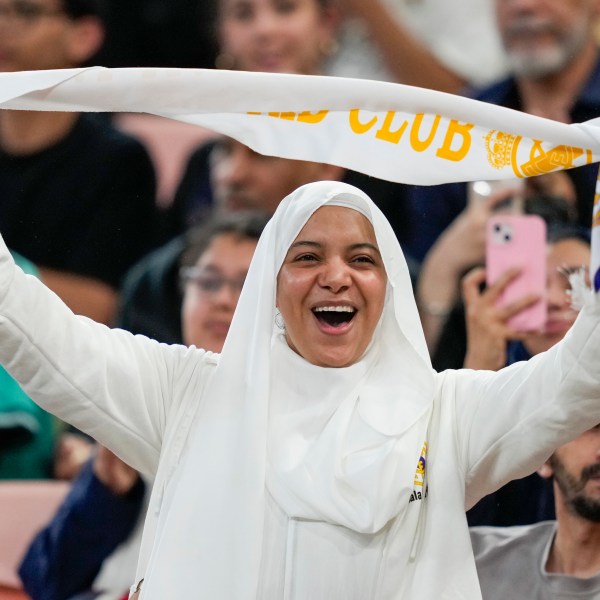 A supporter cheers before the Spanish Super Cup semifinal soccer match between Real Madrid and Mallorca at the King Abdullah Stadium in Jeddah, Saudi Arabia, Thursday, Jan. 9, 2025. (AP Photo/Altaf Qadri)