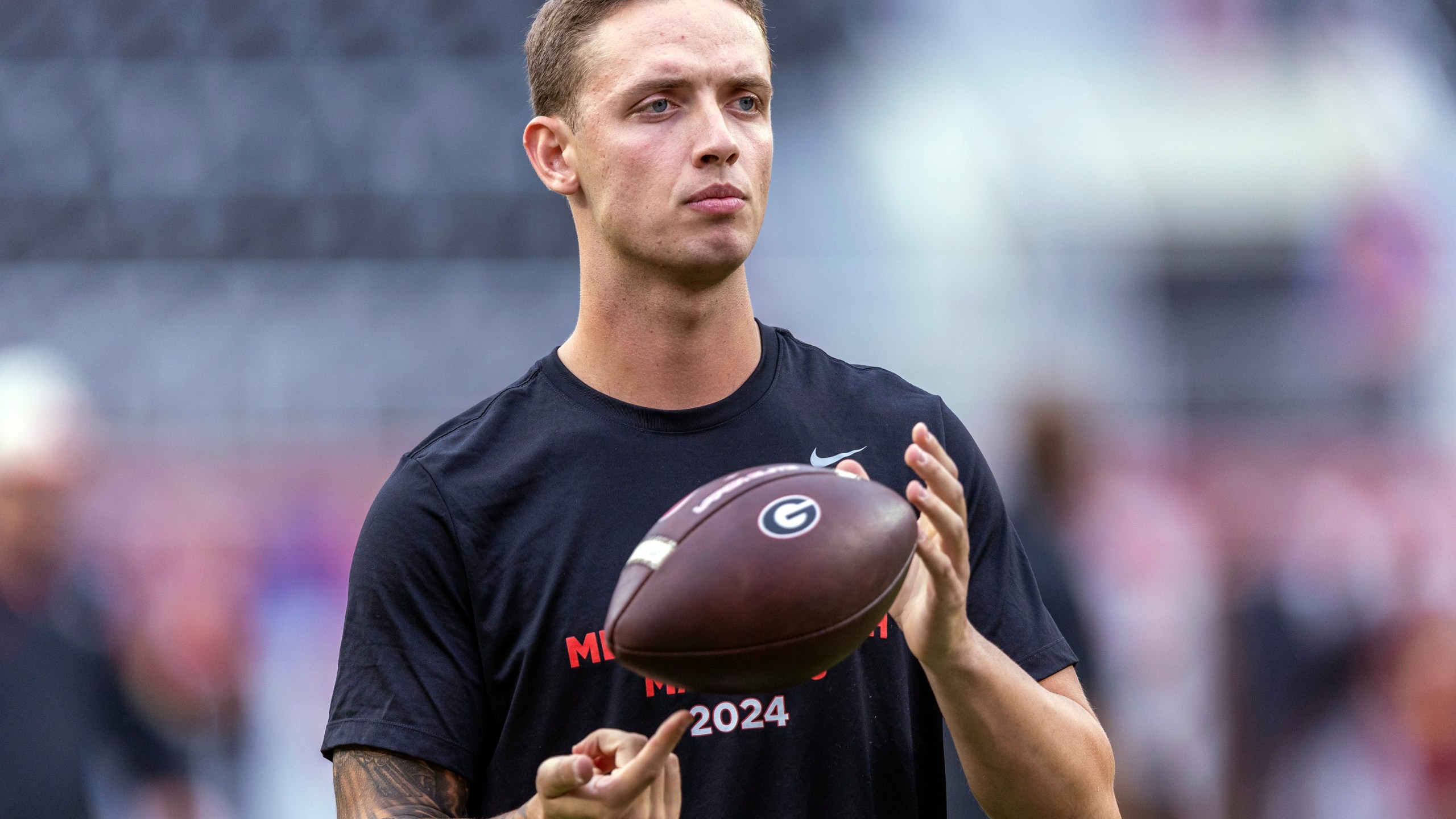 FILE - Georgia quarterback Carson Beck (15) takes the field for early warm-ups before an NCAA college football game against Alabama, Saturday, Sept. 28, 2024, in Tuscaloosa, Ala. (AP Photo/Vasha Hunt, File)