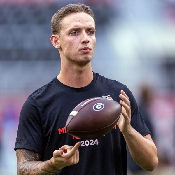 FILE - Georgia quarterback Carson Beck (15) takes the field for early warm-ups before an NCAA college football game against Alabama, Saturday, Sept. 28, 2024, in Tuscaloosa, Ala. (AP Photo/Vasha Hunt, File)