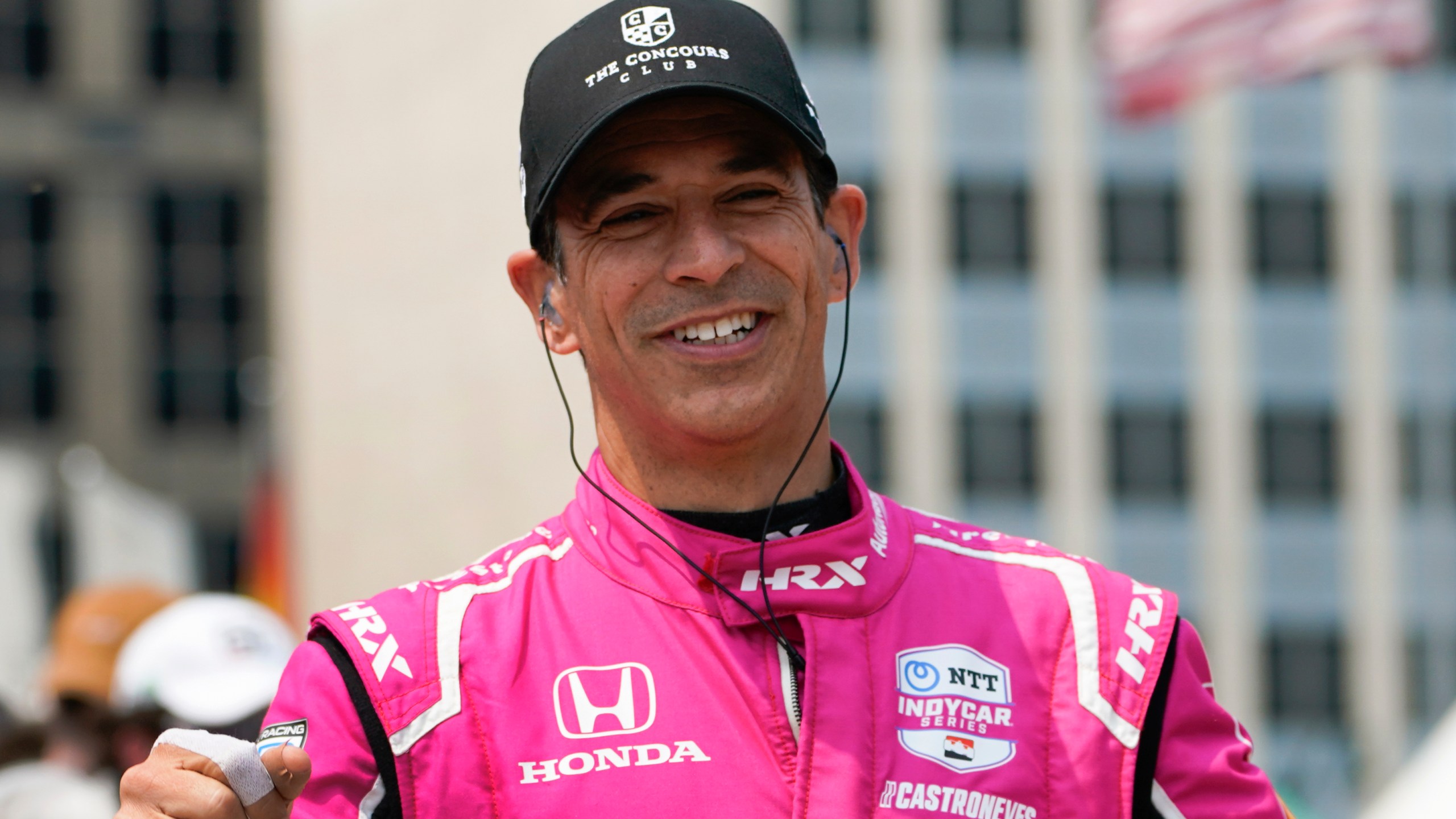 FILE - Helio Castroneves is introduced before the IndyCar Detroit Grand Prix auto race in Detroit, June 4, 2023. (AP Photo/Paul Sancya, file)