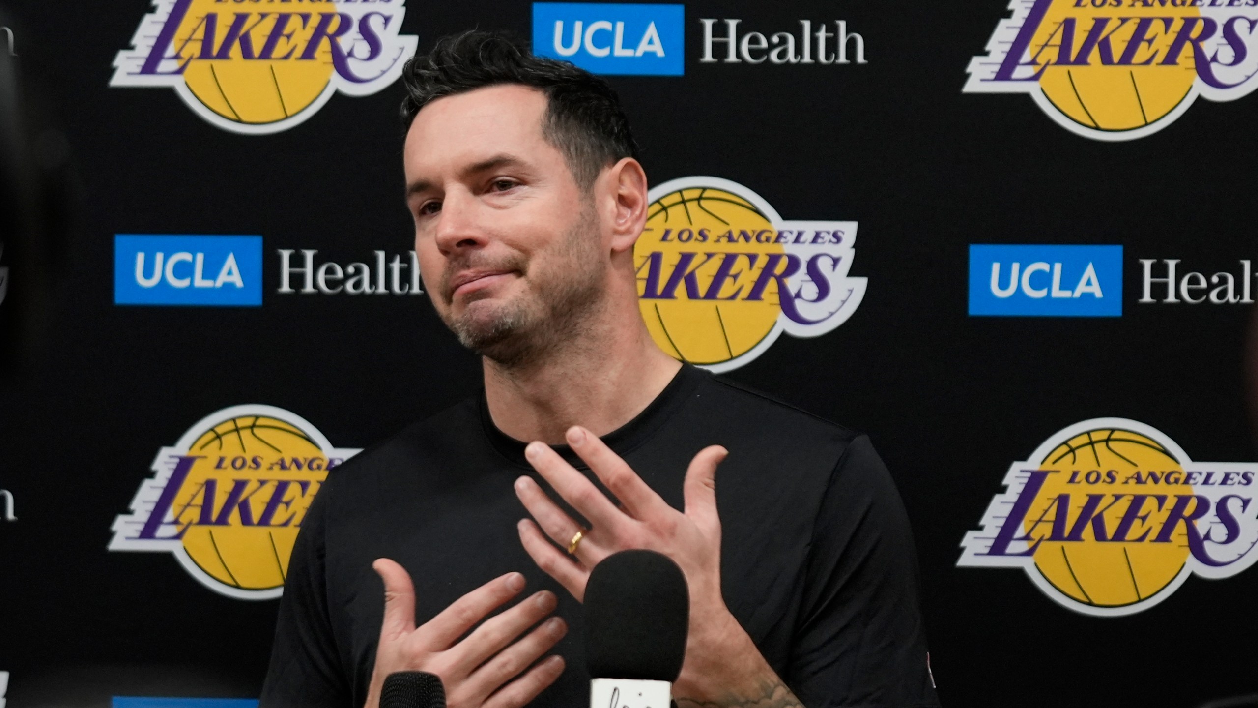 Los Angeles Lakers coach JJ Redick recounts that he and his family lost their house in the deadly Pacific Palisades wildfire during an NBA basketball news conference at the UCLA Health Training Center in El Segundo, Calif., Friday, Jan. 10, 2025. (AP Photo/Damian Dovarganes)