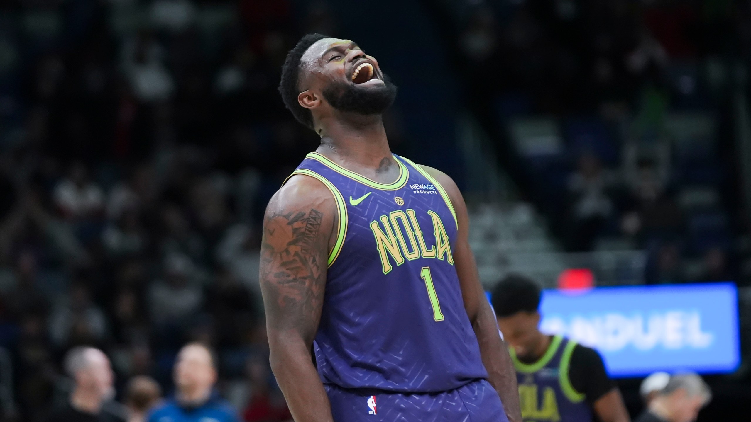 New Orleans Pelicans forward Zion Williamson (1) reacts after his slam dunk in the second half of an NBA basketball game against the Minnesota Timberwolves in New Orleans, Tuesday, Jan. 7, 2025. (AP Photo/Gerald Herbert)