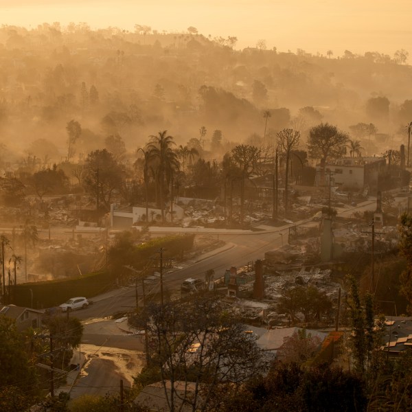 The devastation of the Palisades Fire is seen in the early morning in the Pacific Palisades neighborhood of Los Angeles, Friday, Jan. 10, 2025. (AP Photo/John Locher)