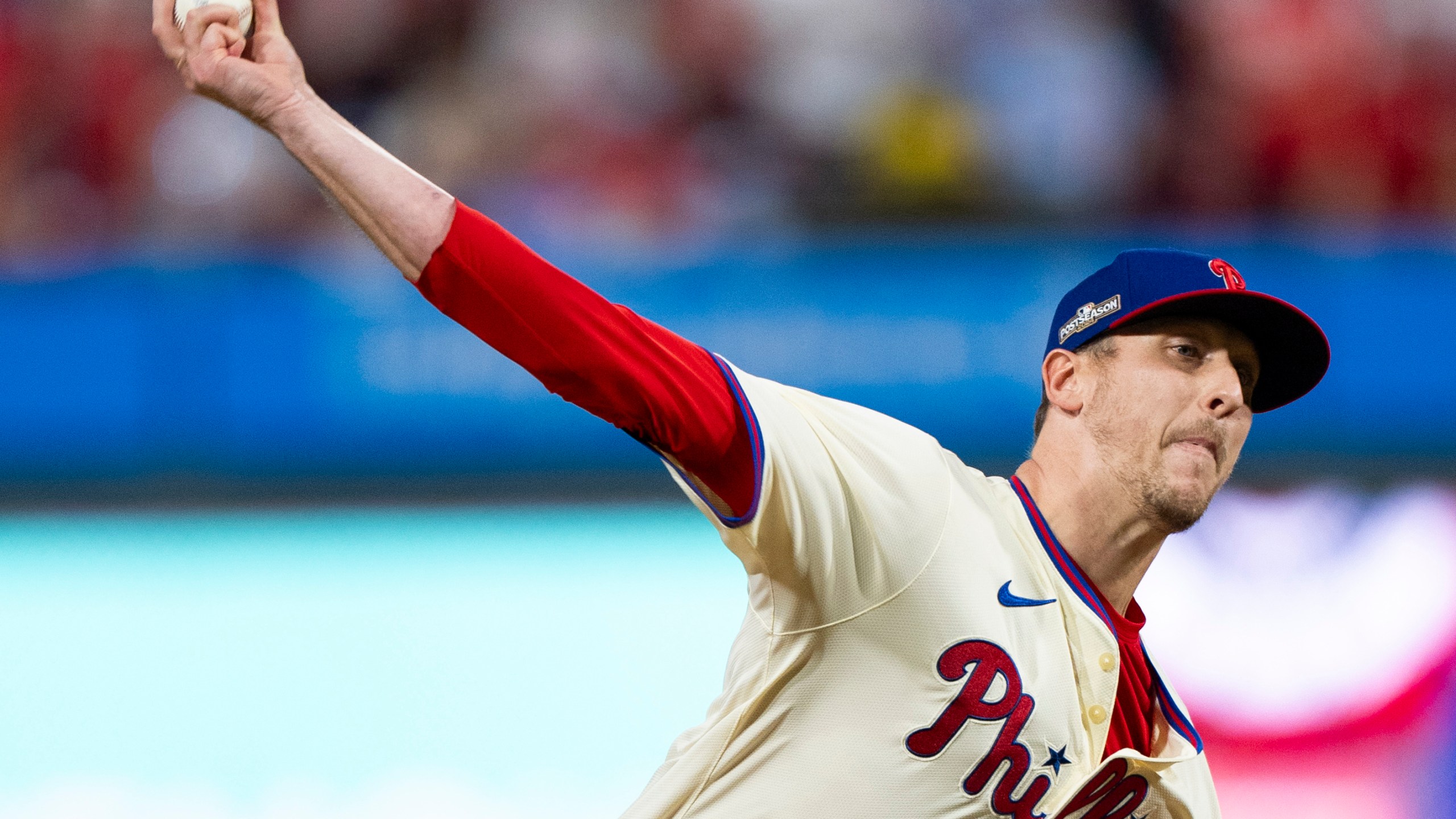 FILE - Philadelphia Phillies relief pitcher Jeff Hoffman delivers during Game 2 of a baseball NL Division Series against the New York Mets, Oct. 6, 2024, in Philadelphia. (AP Photo/Chris Szagola, File)