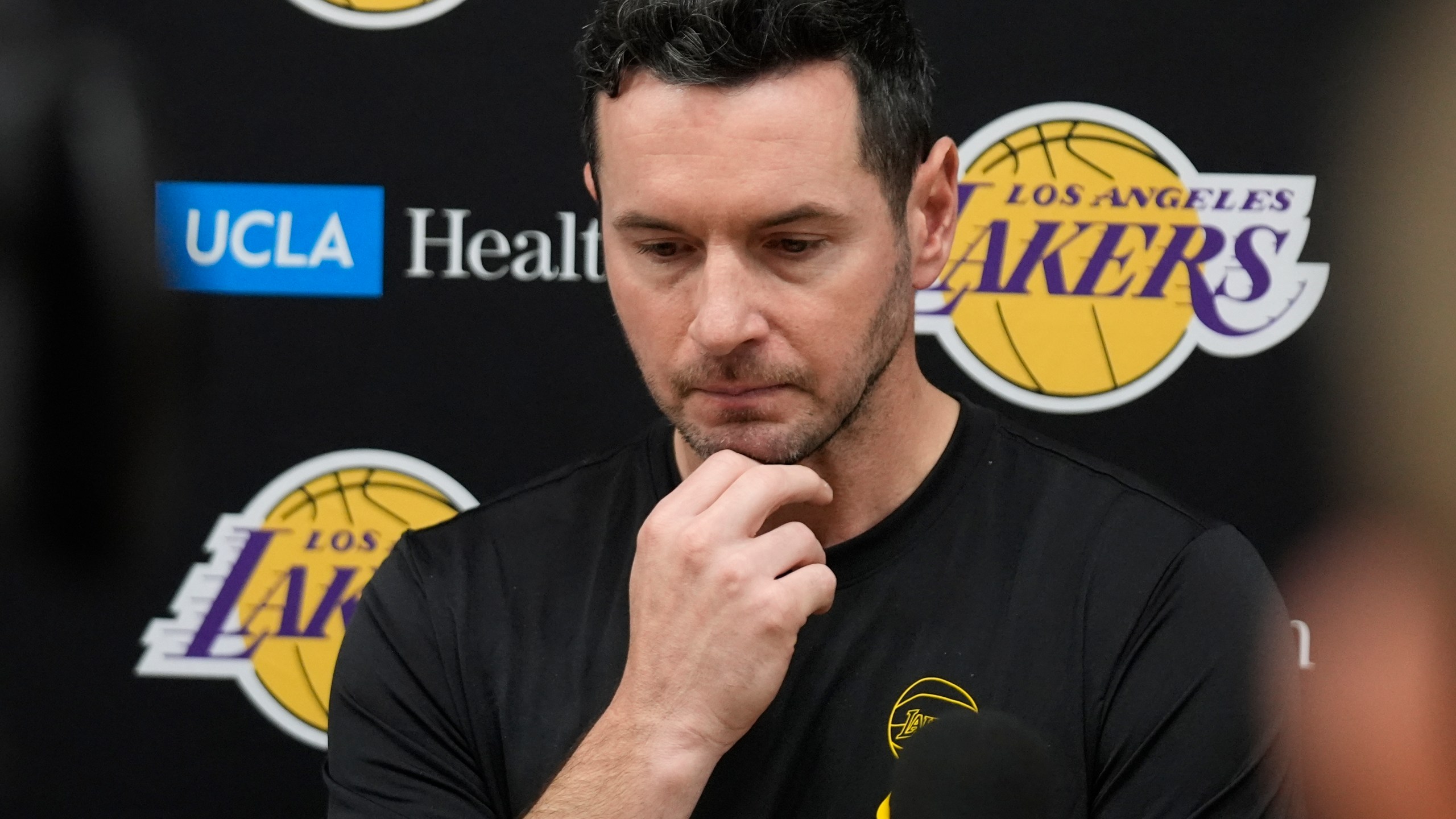 Los Angeles Lakers coach JJ Redick recounts that he and his family lost their house in the deadly Pacific Palisades wildfire during an NBA basketball news conference at the UCLA Health Training Center in El Segundo, Calif., Friday, Jan. 10, 2025. (AP Photo/Damian Dovarganes)