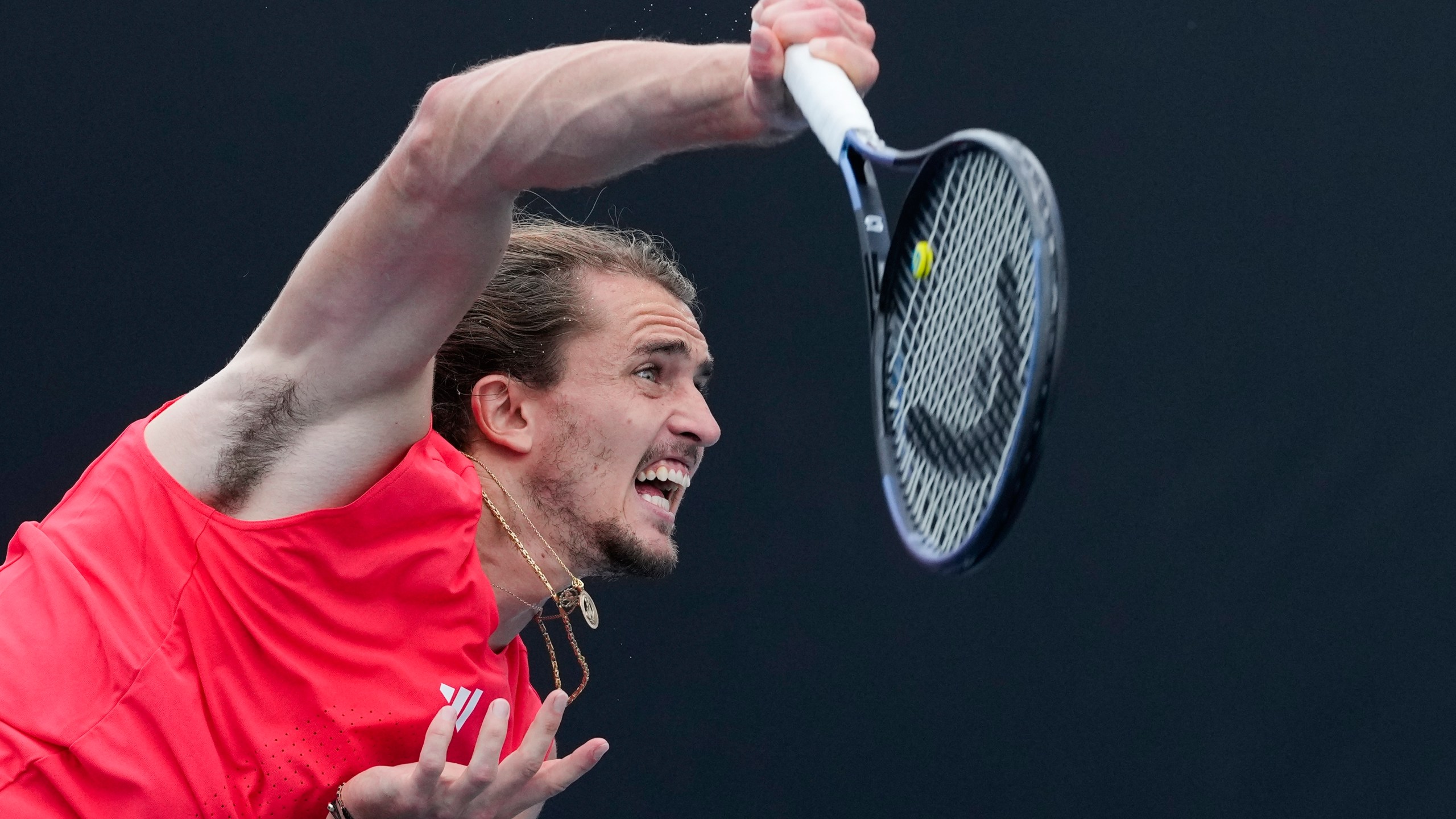 Germany's Alexander Zverev serves during a practice session ahead of the Australian Open tennis championship in Melbourne, Australia, Saturday, Jan. 11, 2025. (AP Photo/Manish Swarup)