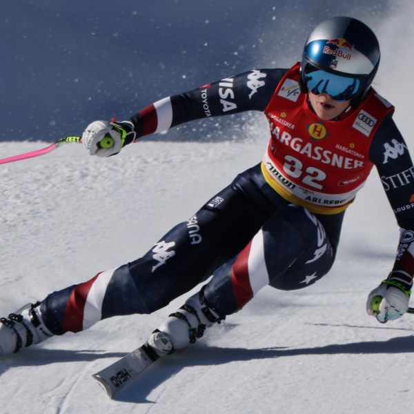 United States Lindsey Vonn speeds down the course during an alpine ski, women's World Cup downhill race, in St. Anton, Austria, Saturday, Jan. 11, 2025. (AP Photo/Marco Trovati)