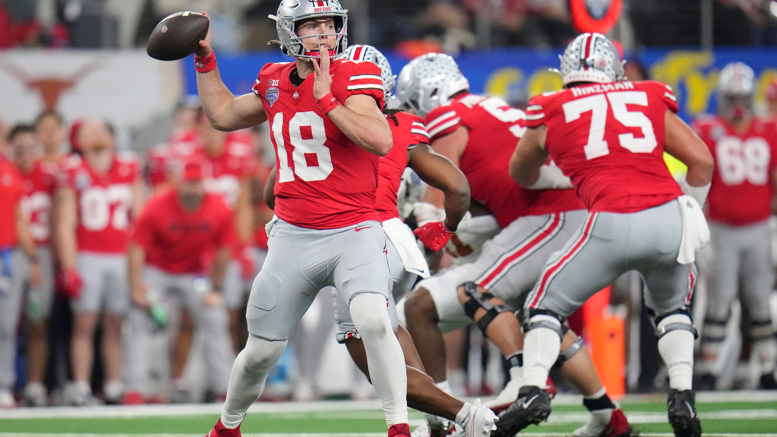 Ohio State quarterback Will Howard (18) passes against Texas during the first half of the Cotton Bowl College Football Playoff semifinal game, Friday, Jan. 10, 2025, in Arlington, Texas. (AP Photo/Julio Cortez)