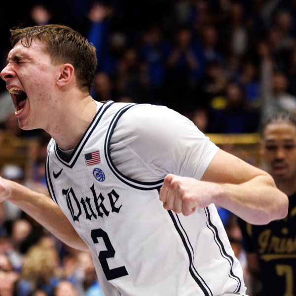 Duke's Cooper Flagg (2) reacts after a dunk during the second half of an NCAA college basketball game against Notre Dame in Durham, N.C., Saturday, Jan. 11, 2025. (AP Photo/Ben McKeown)