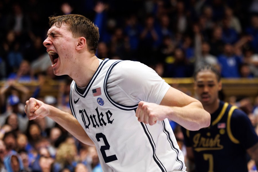 Duke's Cooper Flagg (2) reacts after a dunk during the second half of an NCAA college basketball game against Notre Dame in Durham, N.C., Saturday, Jan. 11, 2025. (AP Photo/Ben McKeown)