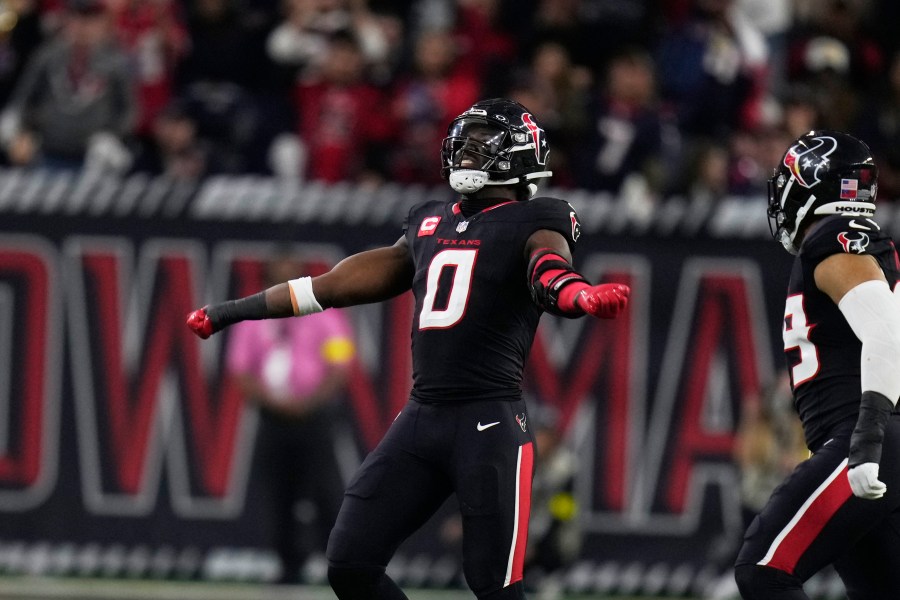 Houston Texans' Azeez Al-Shaair (0) celebrates after making a tackle against the Los Angeles Chargers during the second half of an NFL wild-card playoff football game Saturday, Jan. 11, 2025, in Houston. (AP Photo/Eric Christian Smith)