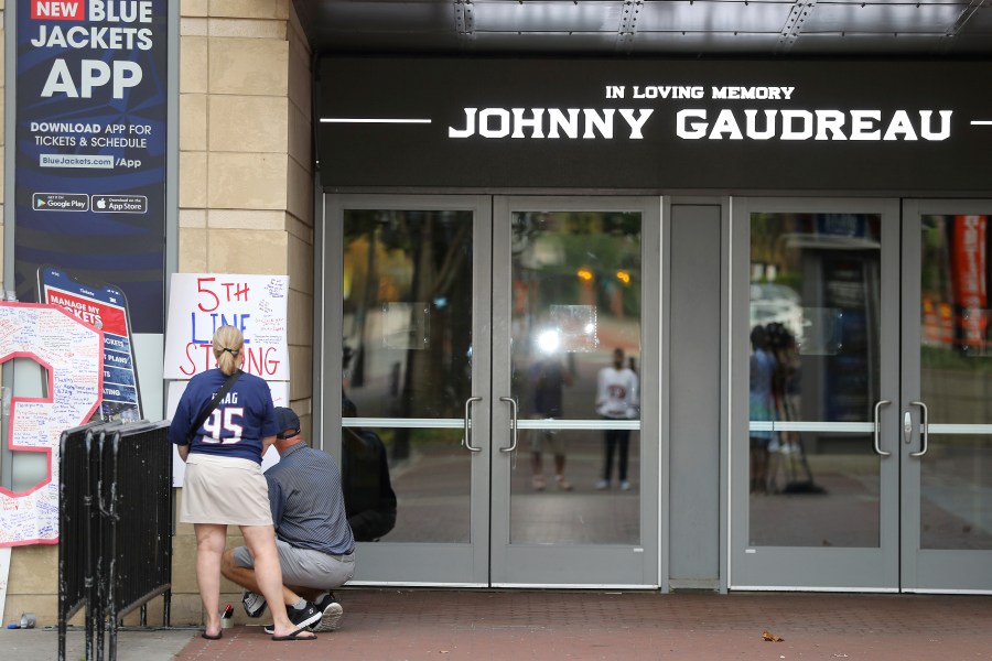 FILE - The view outside of Nationwide Arena at a memorial set up by fans for Blue Jackets hockey player Johnny Gaudreau in Columbus, Ohio, Aug. 30, 2024. (AP Photo/Joe Maiorana, file)