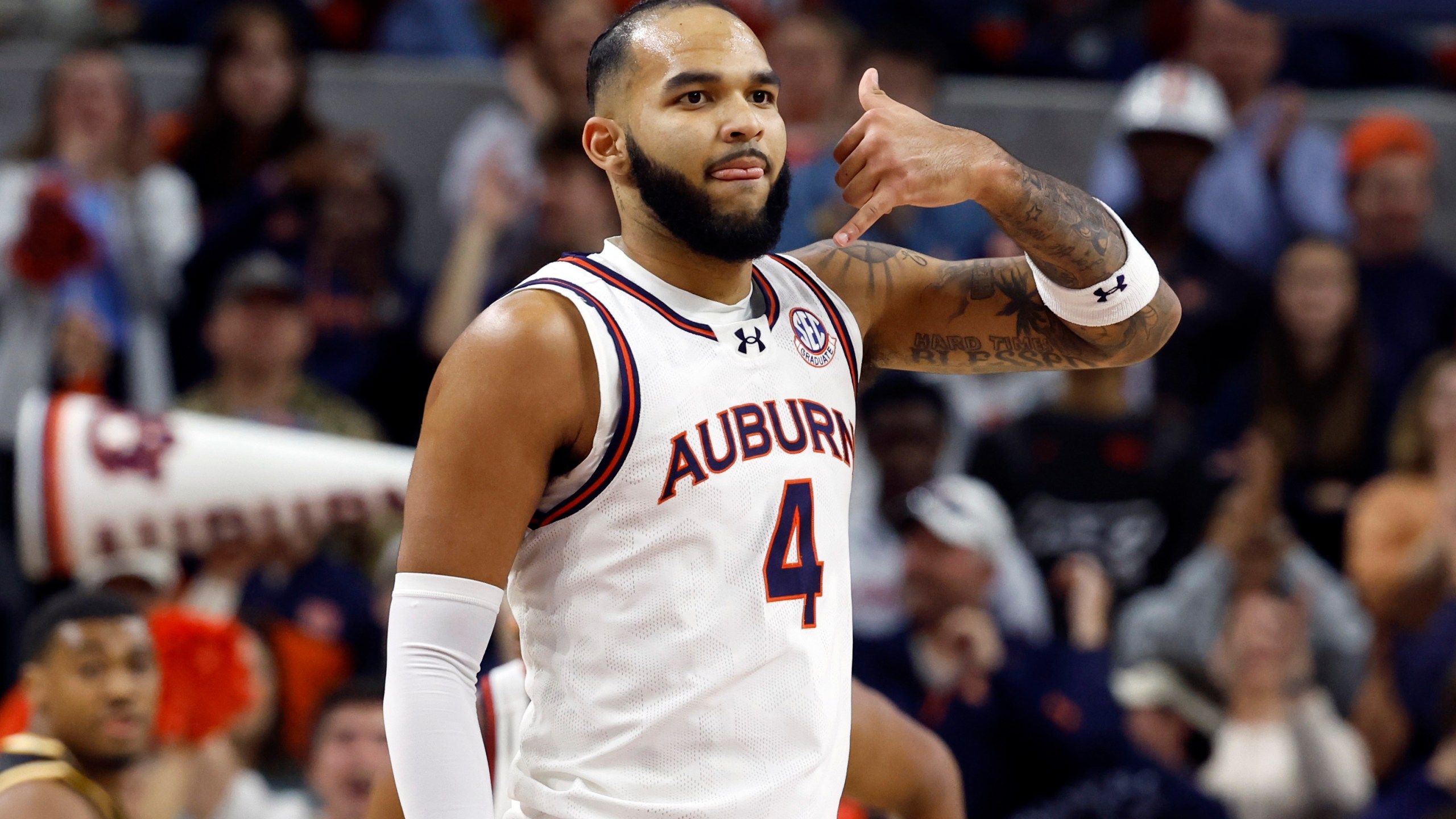 Auburn forward Johni Broome reacts after making a 3-point basket against Missouri during the first half of an NCAA college basketball game, Saturday, Jan. 4, 2025, in Auburn, Ala. (AP Photo/Butch Dill)